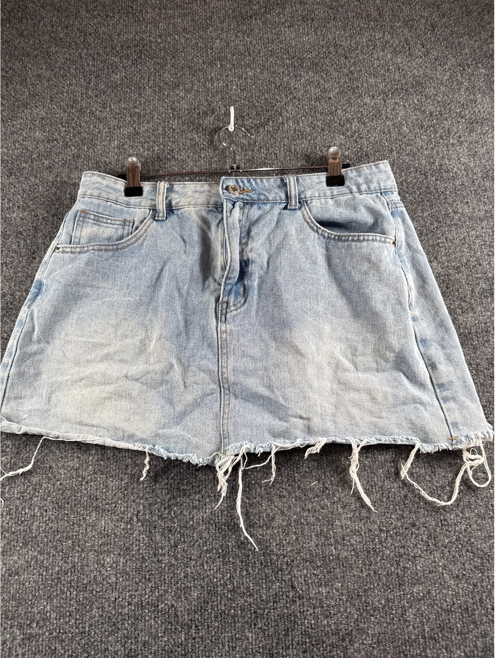 Light Blue Distressed Denim Mini Skirt with Raw Hem